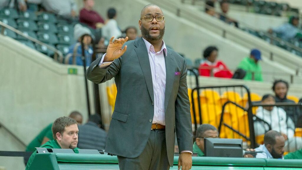 Head Coach Robert Jones coaching from the sidelines