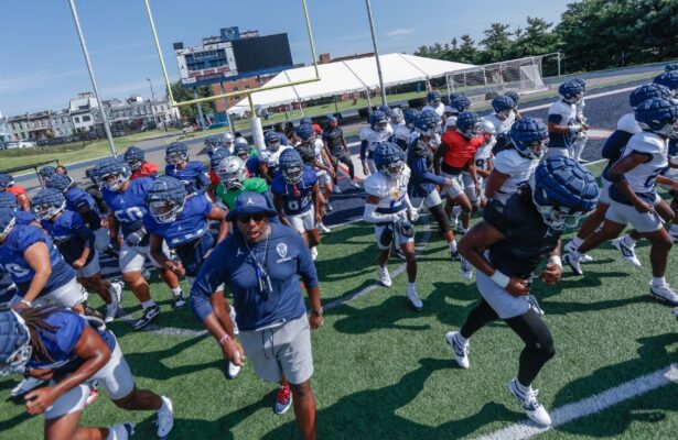 Howard University football players run together during practice at Stadium as the team concludes fall camp ahead of the 2025 season.